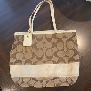 Coach purse, coach logo with white fabric stripe